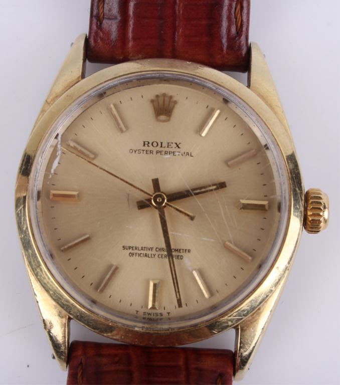Lot 116331: MENS ROLEX OYSTER PERPETUAL 1024 34MM GOLD WATCH