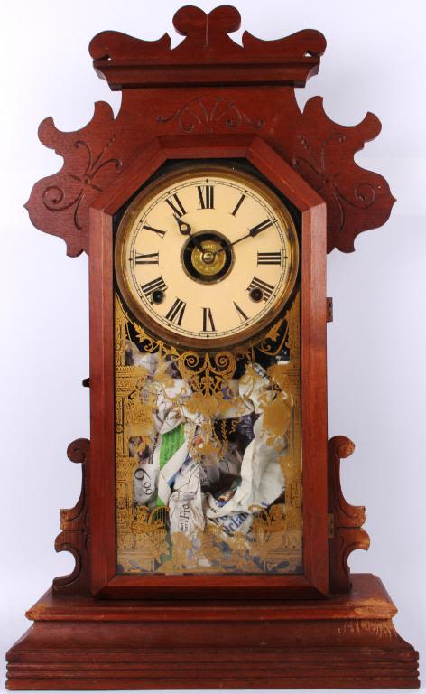 Lot 116347: MANTLE CLOCK WITH GOLD TONED ILLUSTRATIONS