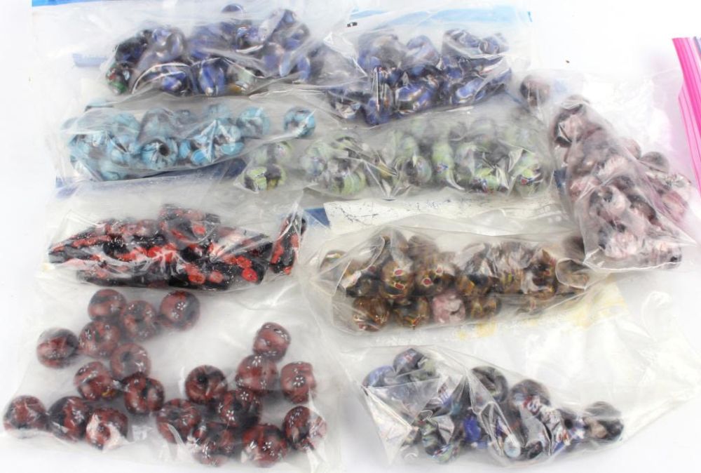 Lot 116374: MARBLE COLORED BEADS - 9 BAGS OF VARIOUS COLORS
