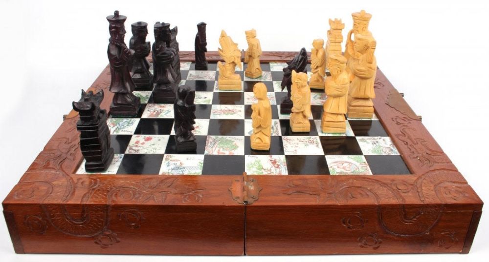 Lot 118235A: ASIAN HAND CARVED WOOD & PORCELAIN CHESS SET