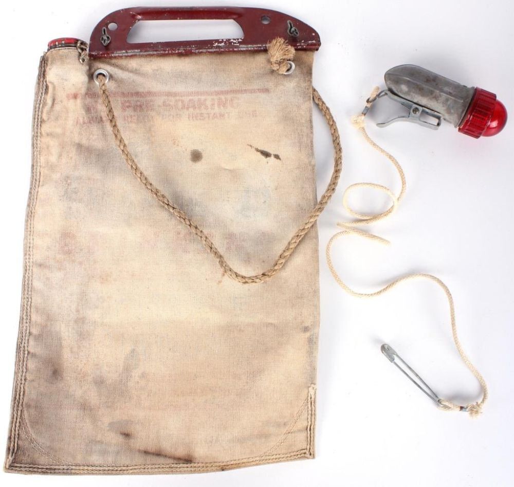 Lot 119240: WWII EAGLE BRAND DRINKING WATER BAG & CLIP LIGHT