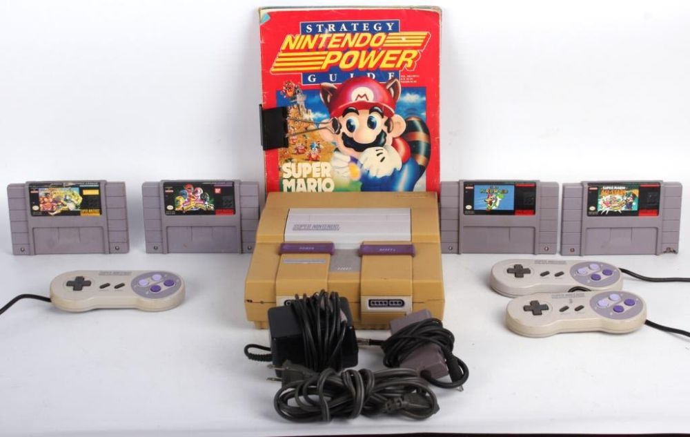 Lot 124250: SUPER NINTENDO W/ MARIO WORLD, STREET FIGHTER, ETC