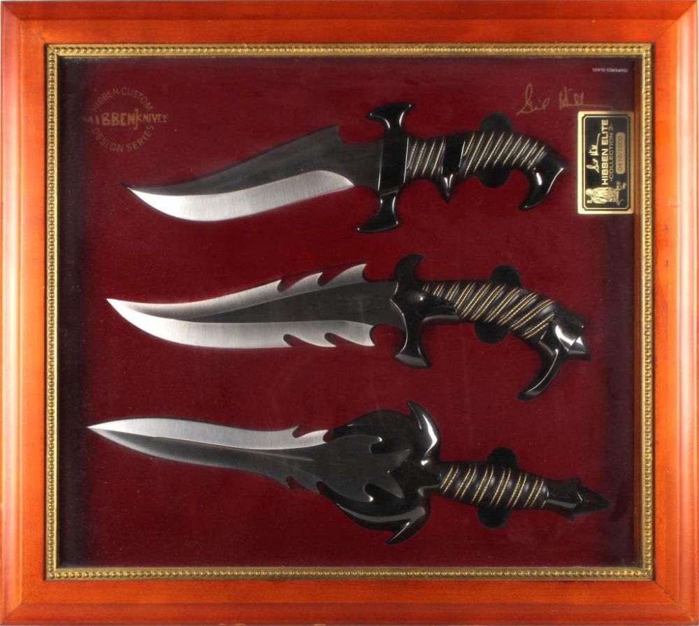 Lot 124259: GIL HIBBEN FANTASY KNIFE COLLECTION 2 IN WOOD CASE
