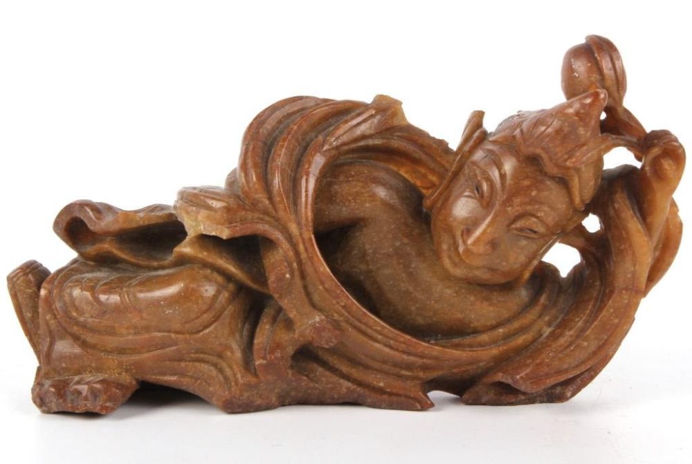 Lot 125355: ASIAN BUDDHIST SOFTSTONE RECLINING FIGURINE