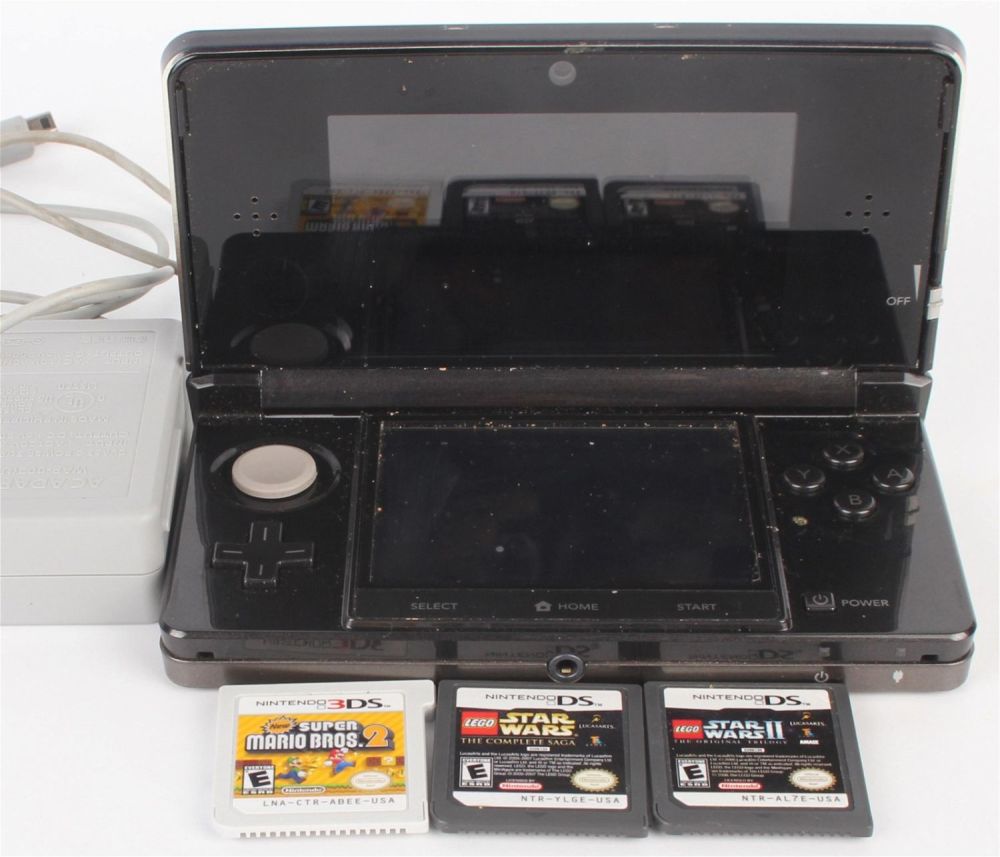 Lot 136185: NINTENDO 3DS BLACK WITH CHARGER AND 3 GAMES