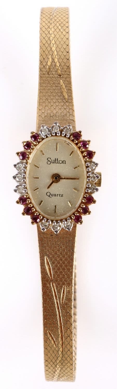 Lot 138192: VINTAGE SUTTON GOLD RUBY & DIAMOND LADIES WATCH