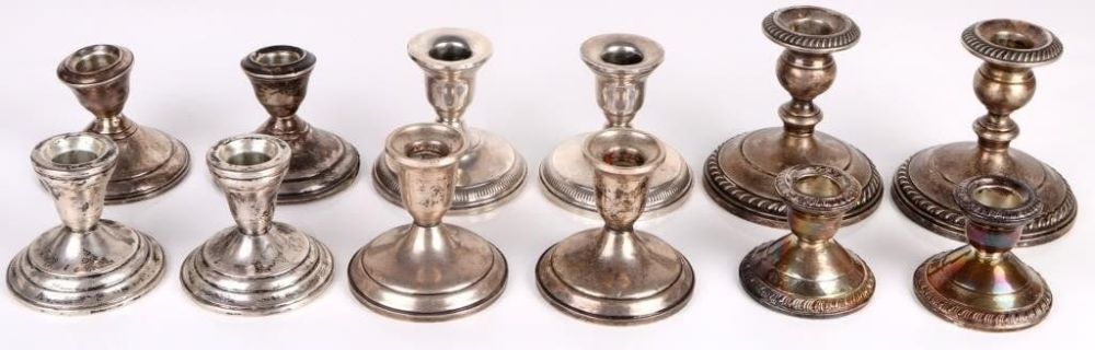 Lot 157199: ANTIQUE STERLING SILVER WEGHTED CANDLE HOLDERS