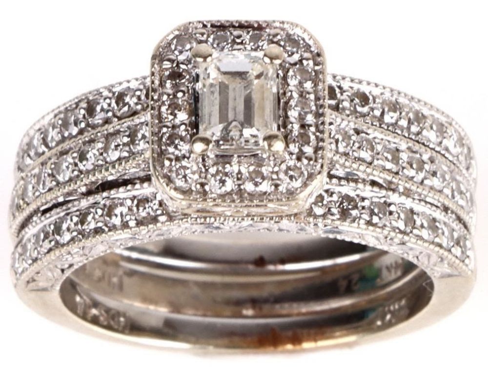 Lot 165148: 14K WHITE GOLD DIAMOND HALO LADIES RING - 0.75 CTW