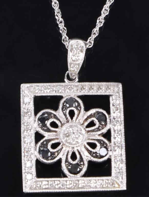 Lot 172140: 10K WHITE GOLD DIAMOND & RUBY FLORAL NECKLACE