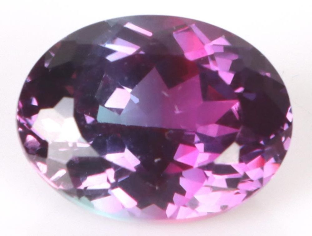 Lot 174158: 9.80CT OVAL NATURAL BI-COLOR SAPPHIRE W/ AGL CERT