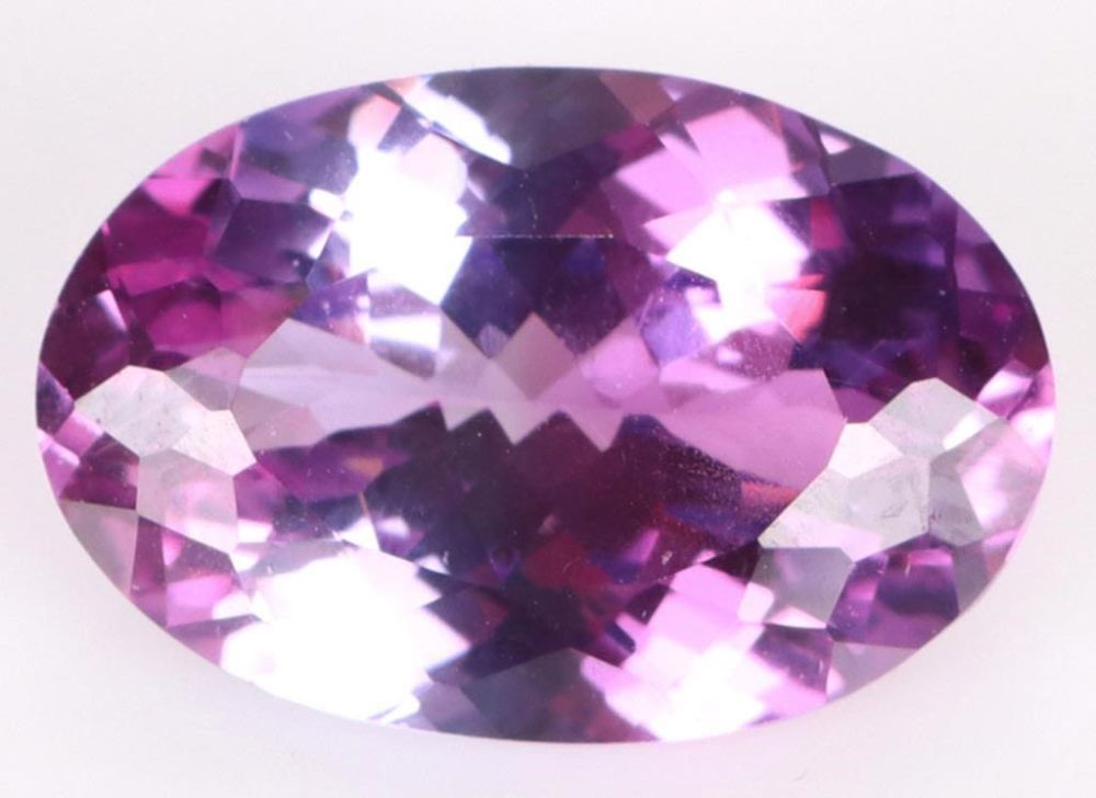 Lot 174160: 8.90CT OVAL NATURAL BI-COLOR SAPPHIRE W/ AGL CERT