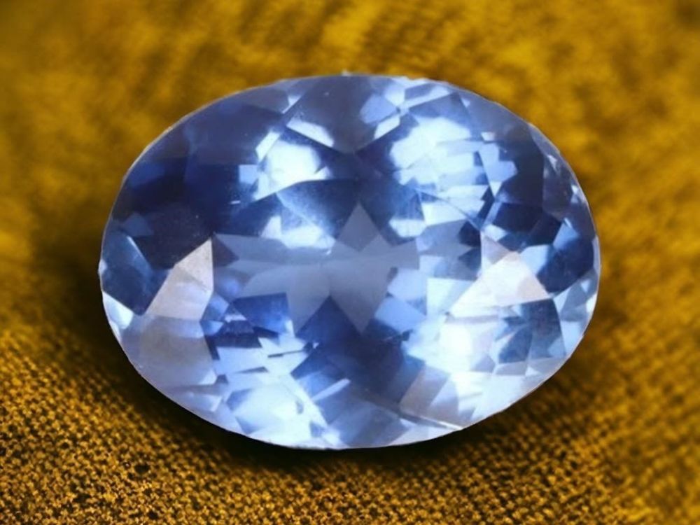 Lot 174163: 6.05CT OVAL NATURAL BLUE SAPPHIRE W/ GIE CERT