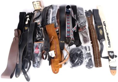 ASSORTED NAME BRAND GUITAR STRAPS - LOT OF 25. Assorted name brand guitar straps, 25 total. 
