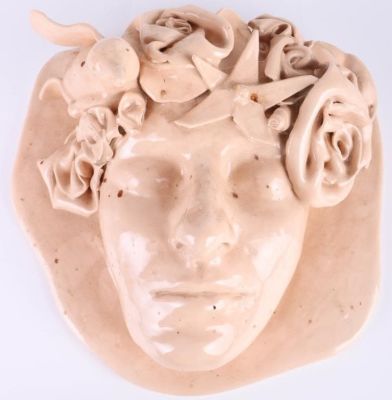 HAND-MADE GLAZED PORCELAIN WALL PORTRAIT. Hand-made pink glazed porcelain wall portrait. Piece 