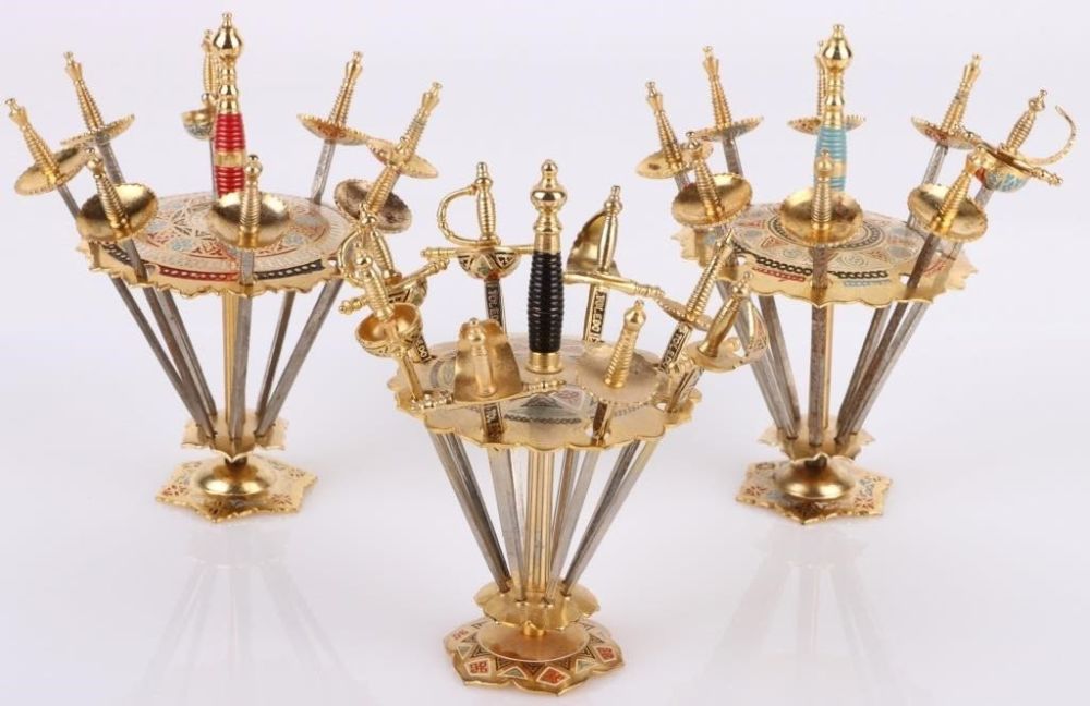 Lot 176404: 1960'S TOLEDO SPAIN SWORD COCKTAIL PICK SETS - (3)