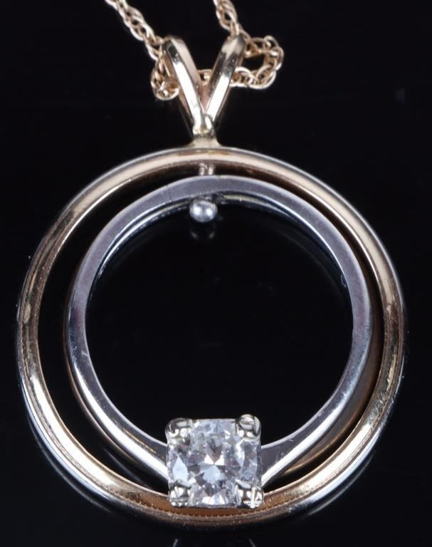 Lot 178203: 14K GOLD SPINNING .60CT DIAMOND PENDANT NECKLACE