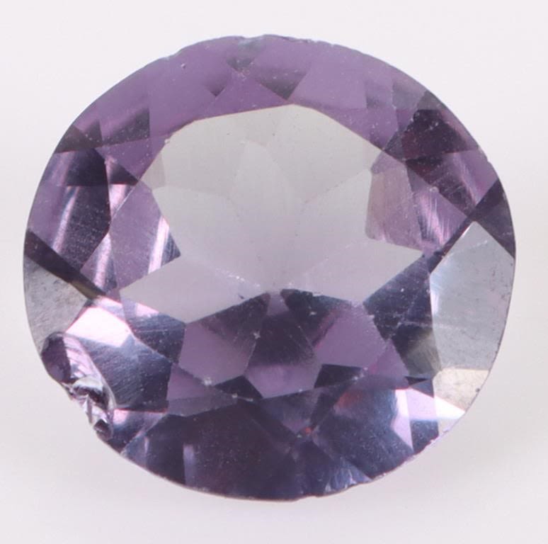 Lot 181196: 5.60CT ROUND-CUT BI-COLOR SAPPHIRE GEMSTONE