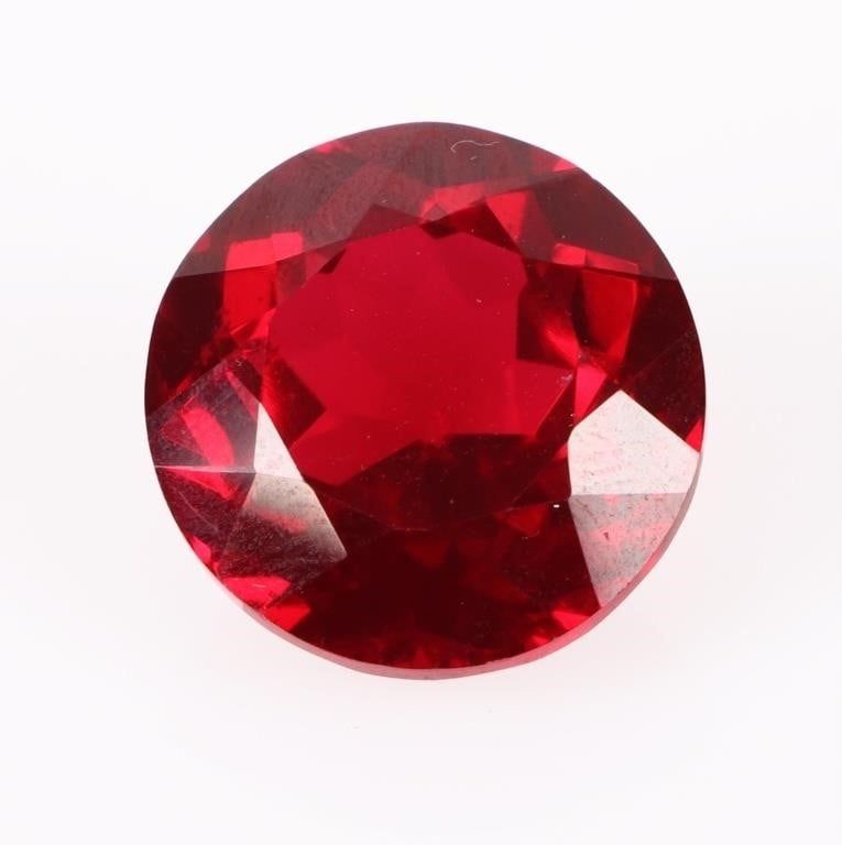 Lot 185177: 43.35CT LOOSE ROUND CUT RED RUBY