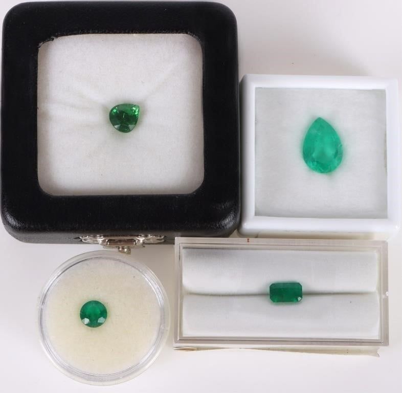 Lot 185185: ASSORTED CUT EMERALDS 8.56 CT TOTAL W/ CASES - (4)