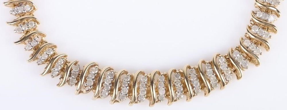 Lot 185214: 10K YELLOW GOLD GRADUATED DIAMOND NECKLACE