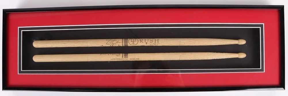 Lot 191283: PLAYED NEIL PEART RUSH STAGE DRUMSTICKS FRAMED