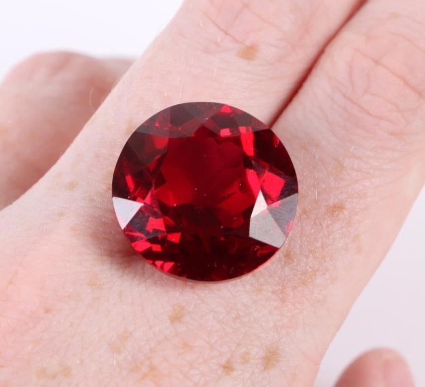 Lot 194152: 43.35CT LOOSE ROUND CUT RED RUBY