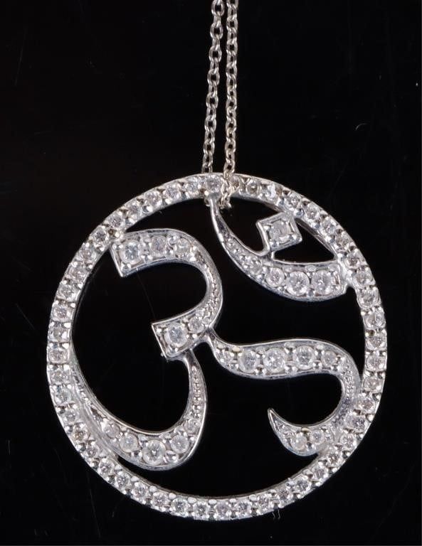Lot 194182: 18K WHITE GOLD RUBY DIAMOND "OHM" HINDU NECKLACE