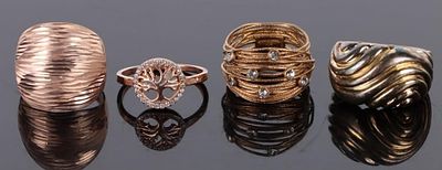 GOLD-TONED STERLING SILVER LADIES RINGS. Gold-toned sterling silver ladies rings. Lot of 4.Size: 