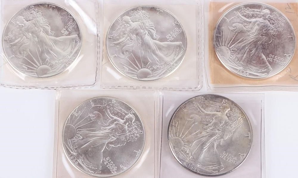 Lot 195325: 1986 BU SILVER AMERICAN EAGLE BULLION COINS (5)