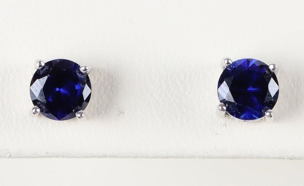Lot 199233: BLUE TOPAZ STERLING SILVER LADIES STUD EARRINGS