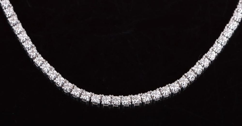 Lot 199304: 10K WHITE GOLD MOISSANITE LADIES NECKLACE- 15CTW
