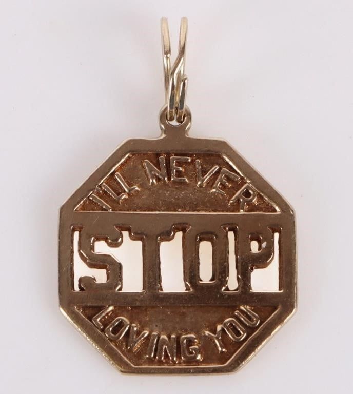 Lot 199315: 10K YELLOW GOLD 'STOP' LADIES BRACELET CHARM