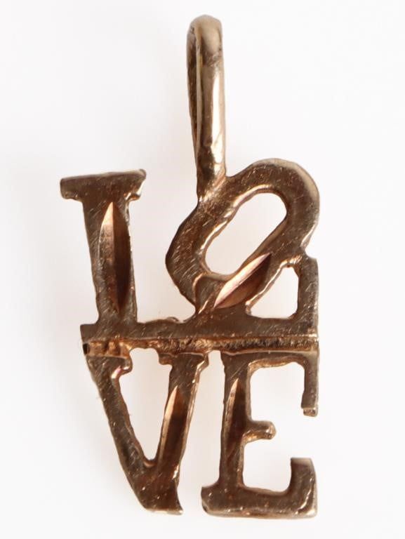 Lot 199335: 14K YELLOW GOLD 'LOVE' LADIES PENDANT