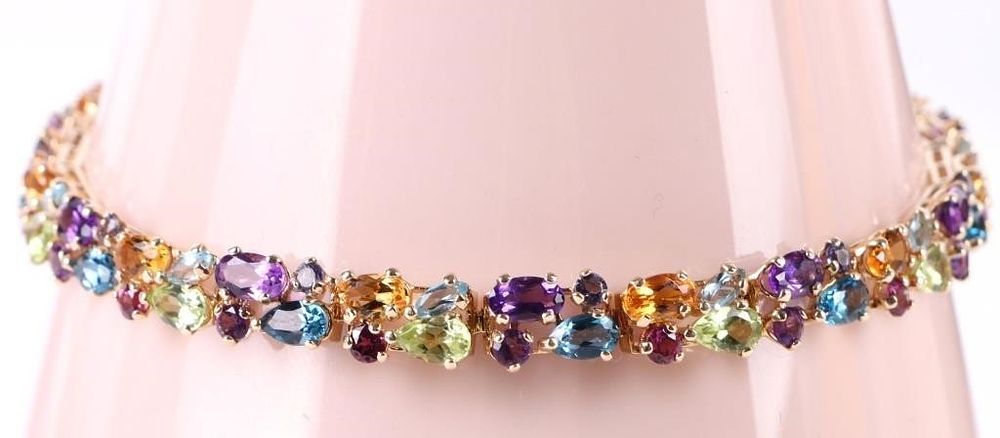 Lot 200197: 14K YELLOW GOLD RAINBOW GEMSTONE LADIES BRACELET