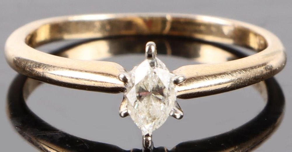 Lot 202185: 0.15CT MARQUISE DIAMOND 14K YELLOW GOLD RING