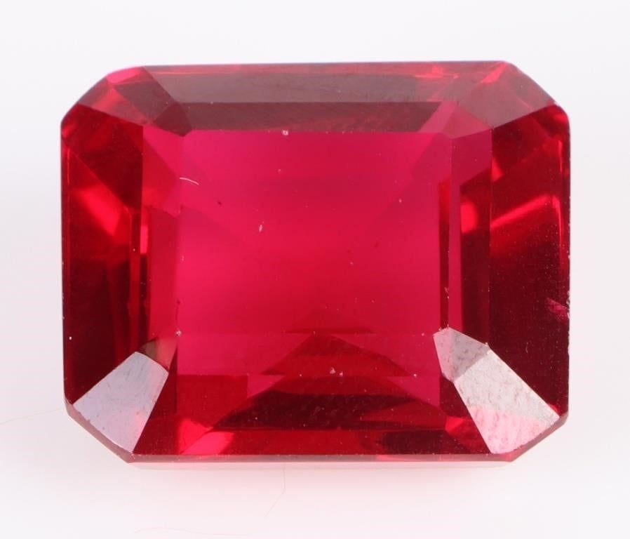 Lot 202249: 37.3CT EMERALD CUT RED RUBY GEMSTONE