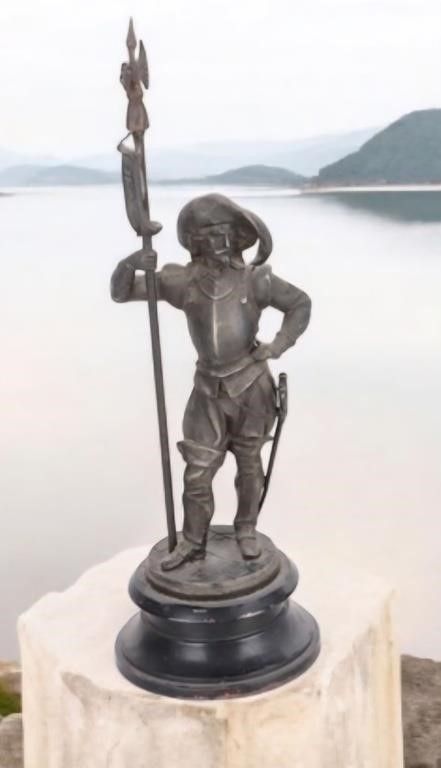 Lot 204459: CONQUISTADOR W/ AXE FIGURAL BRONZE STATUE