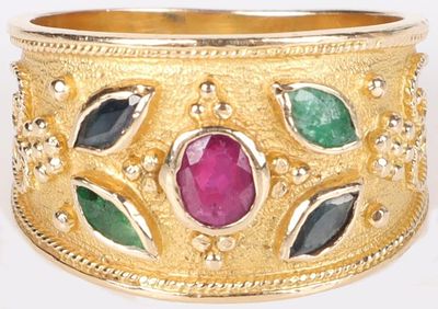 RUBY, SAPPHIRE & EMERALD 14K YELLOW GOLD RING. 14k yellow gold ladies ring with one 0.20ct oval