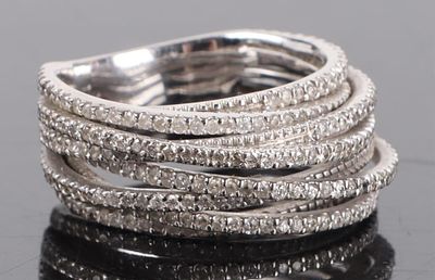 14K WHITE GOLD DIAMOND FORKED BAND LADIES RING. 14K white gold diamond forked band ladies ring.