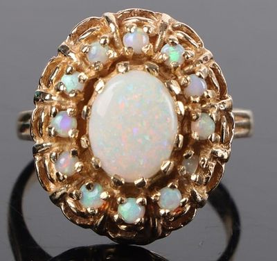 14K YELLOW GOLD OPAL ORNATE LADIES RING. 14K yellow gold opal ornate ladies ring to include one