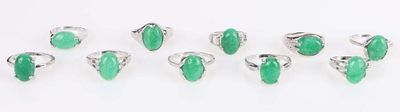 GREEN JADE LADIES SILVER-TONE RINGS - LOT OF 10. Green jade ladies silver-tone rings - lot of