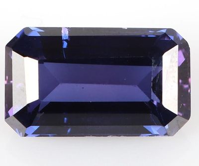 9.20CT BI-COLOR SAPPHIRE LOOSE GEMSTONE. 9.20ct emerald-cut bi-color blue and purple Sapphire