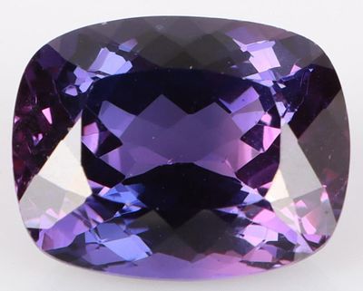 LARGE 17.55CT BI-COLOR SAPPHIRE LOOSE GEMSTONE. Large 17.55ct cushion-cut bi-color blue and