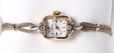 14K YELLOW GOLD DIAMOND LADY HAMILTON WATCH. 14k yellow gold diamond Lady Hamilton wristwatch to