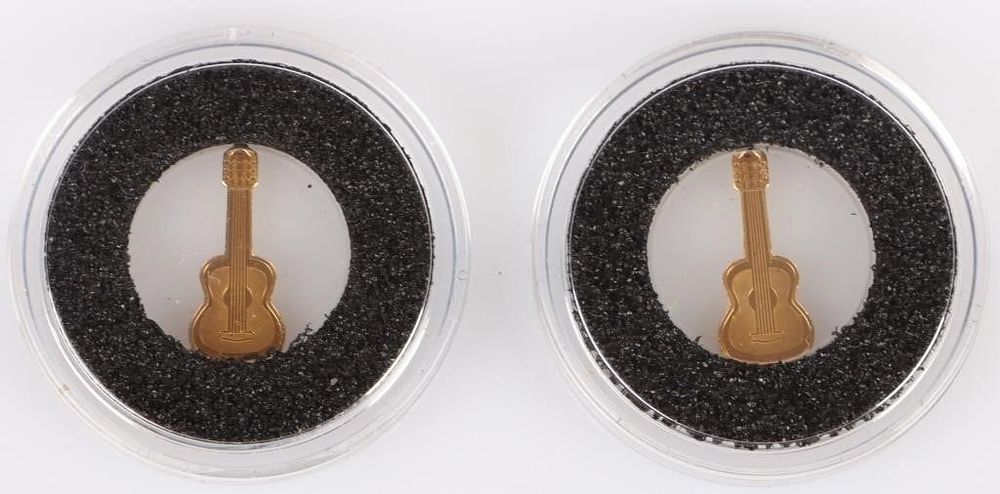 Lot 210249: PALAU 1/2G GOLD GUITAR SHAPED $1 COIN SET OF 2