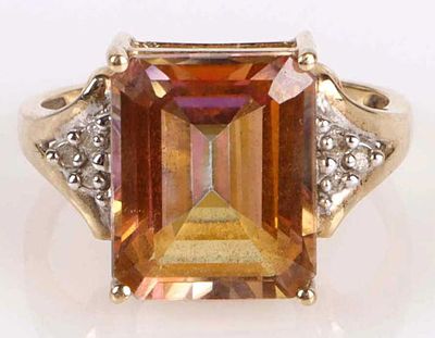 6.0CT EMERALD-CUT SAPPHIRE 10K YELLOW GOLD RING. 6.0ct emerald-cut yellow-pink sapphire 10k 