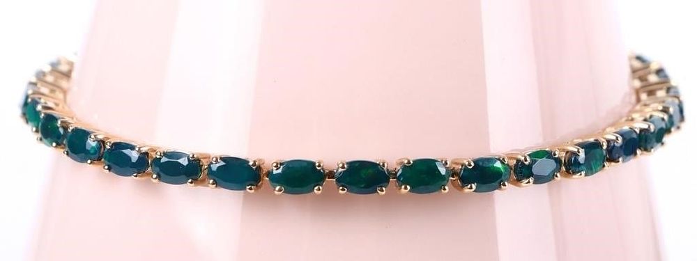 Lot 211283: 10K YELLOW GOLD LADIES BRACELET W/ GREEN STONES