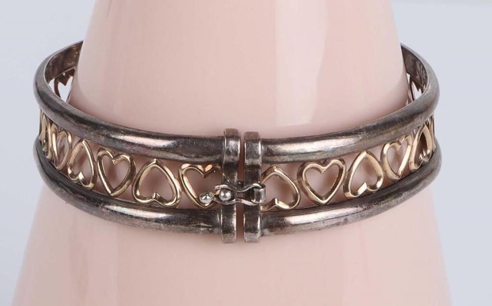 Lot 211290: 14K YELLOW GOLD & STERLING SILVER HEART BRACELET