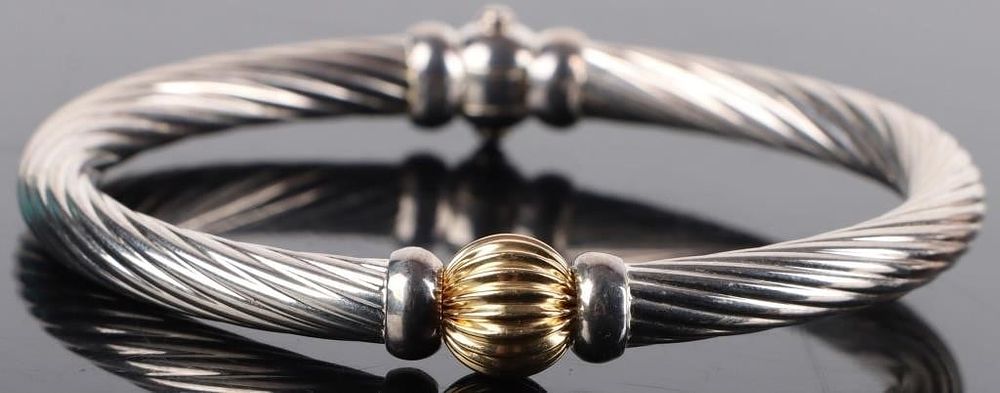Lot 211296: OVAL STERLING SILVER & 14K HINGED TWISTED BANGLE