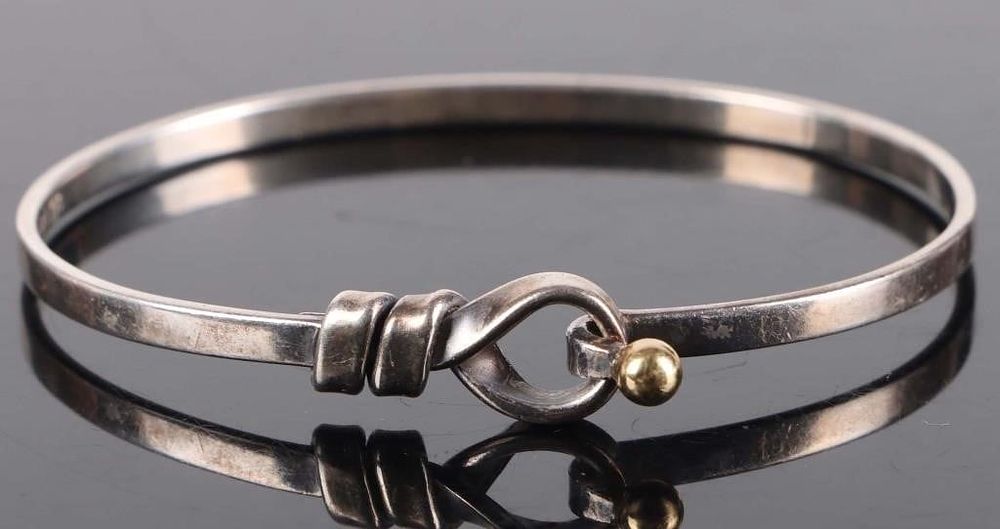 Lot 211301: TIFFANY & CO. SILVER 18K GOLD HOOK & EYE BRACELET
